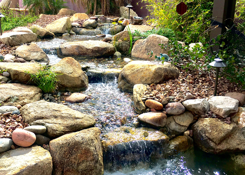Residential Pondless Waterfall with Rock, Plants and Lighting