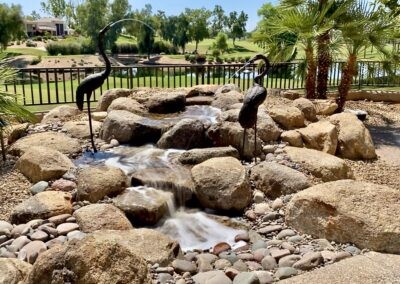 A water fountain in a garden.